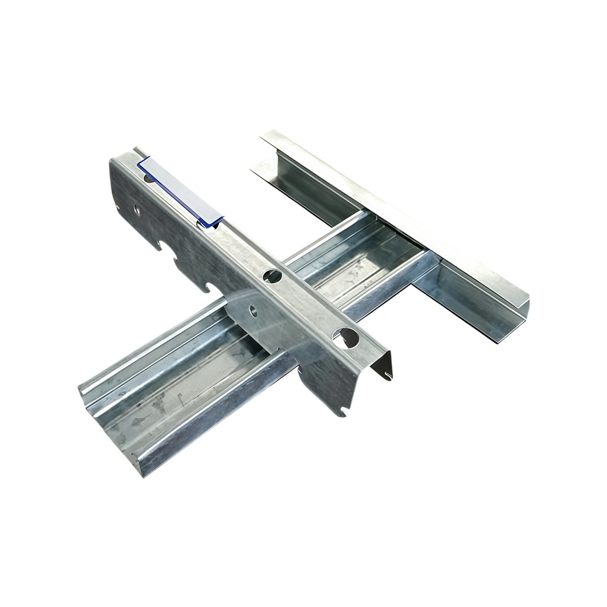 Galvanized ceiling and partition steel framing profiles crossed over one another on a white background